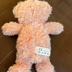 ピンクのくまぬいぐるみの画像