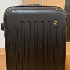 取引中　スーツケース