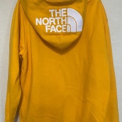 THE NORTH FACE イエローフーディ Lサイズの画像