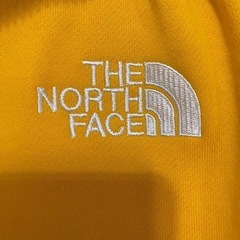 THE NORTH FACE イエローフーディ Lサイズの画像