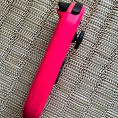 左ジョイコン ネオンピンク ストラップ付きの画像