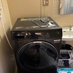 ドラム式洗濯機引取り中の画像