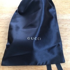 GUCCIのストライプデザインのサングラス、専用ケース付き。の画像