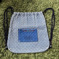 リュック バッグ シューズ入れの画像