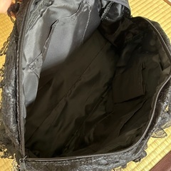 黒レースのバッグの画像