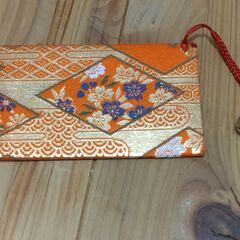 小物入れ　オレンジ　花の画像
