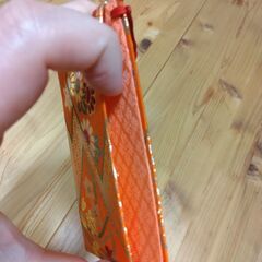 小物入れ　オレンジ　花の画像