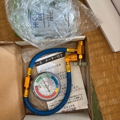 カーエアコンチャージホースとガス新品1缶の画像