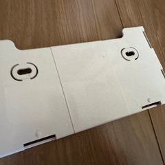 INAX イナックス　ウォシュレット　リモコンと取り付けプレート（ネジ付き）の画像