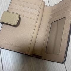 マイケルコース　二つ折り財布　ベージュの画像