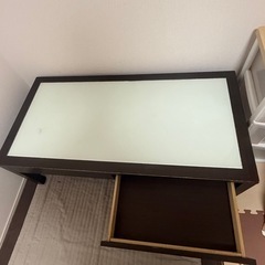 ダークブラウンローテーブル引出し付きの画像