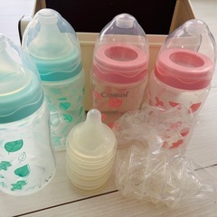 哺乳瓶4本と除菌じょーずの画像