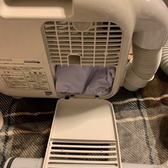 紙パック掃除機、布団乾燥機のセットの画像