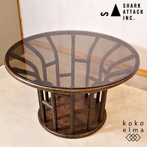 SHARK ATTACK(シャークアタック)で取り扱われていたヴィンテージ 円形ダイニングテーブルです。ユニークなデザインのウッドフレームが目を引くガラス天板のラウンドテーブル。