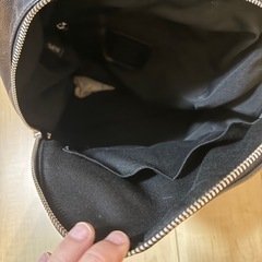 コーチ　メンズブラックリュックサック　の画像