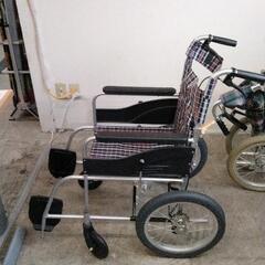 0603-004 車椅子　日進医療器ノーパンクタイヤ背折式　レッグサポート付きの画像