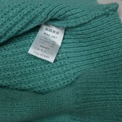 グリーンのカーディガンの画像