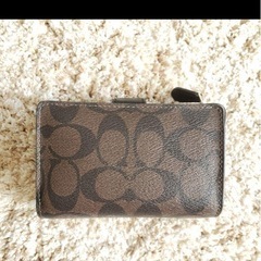 COACH 二つ折り財布 ブラウンの画像