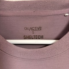 GU ACTIVE SHELTECH パープル トップス Sの画像