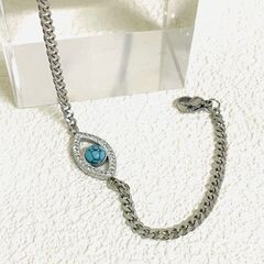 新品✨クールな邪眼モチーフ シルバーブレスレット ターコイズ風お守りの画像