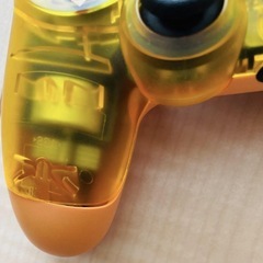 1TBストレージのデスストランディング限定版PS4 Pro、透明オレンジのコントローラー付き。の画像