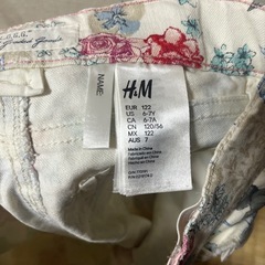 H&M 花柄スリムフィットパンツの画像