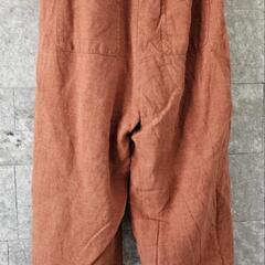 オレンジ　パンツの画像