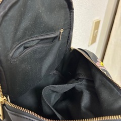 黒のリュック スタッズ 刺繍の画像