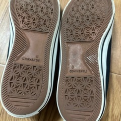 CONVERSEの黒色のスニーカー。紐なしです。の画像