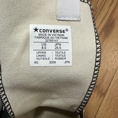CONVERSEの黒色のスニーカー。紐なしです。の画像