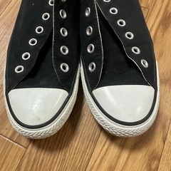 CONVERSEの黒色のスニーカー。紐なしです。の画像