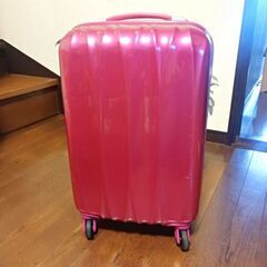 ビンク色のスーツケース