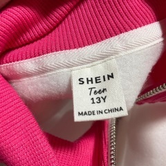 服(ハーフジップ)の画像
