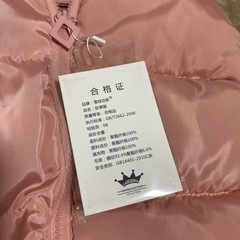 新品タグ付き フード付きダウンベストの画像