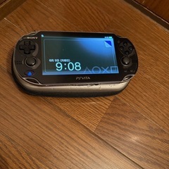 SONYVita ケース 充電器付きの画像