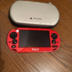 SONYVita ケース 充電器付きの画像