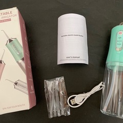 PORTABLE ORAL IRRIGATOR 口腔洗浄機