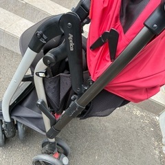 aprica ベビーカー　オプティア　赤の画像
