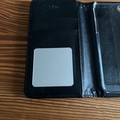 iPhone SE第二世代、7、8対応　リボン付き黒合成皮革カバーの画像