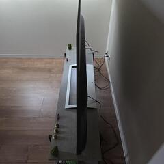 65インチTV、テレビボードセットの画像