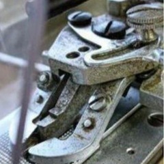 工業用ミシン　ボタン付けミシンの画像