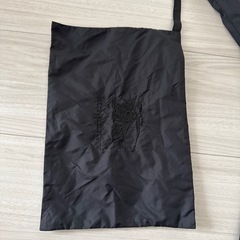 携帯袋付きバーバリー黒レインジャケット子供用の画像