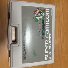 ケース付スーパーファミコン本体とソフト12点の画像