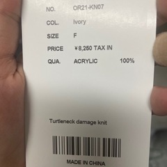 新タグ付き タートルネック ニット レディースの画像