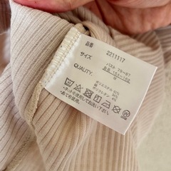 レディースくすみピンク七分丈リブニットブラウスの画像