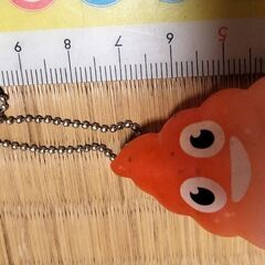 身につけてると運がつくかも、うんちキーホルダー、オレンジの画像