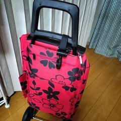 赤い花柄のcocoroショッピングカートの画像