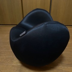 座ってバランスをとるの画像
