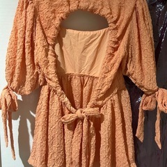 未使用品⭐︎オレンジの背中開きペプラムトップスの画像