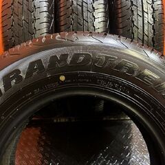 【新車外し】23年製 DUNLOP GRANDTREK AT20 195/80R15 15インチ 夏タイヤ 4本 ジムニーシエラ パジェロミニ等　(VTI188) の画像